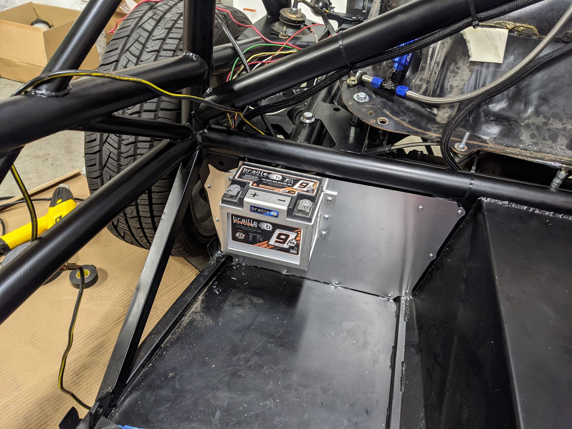 Lightweight Braille battery installed behind passenger seat