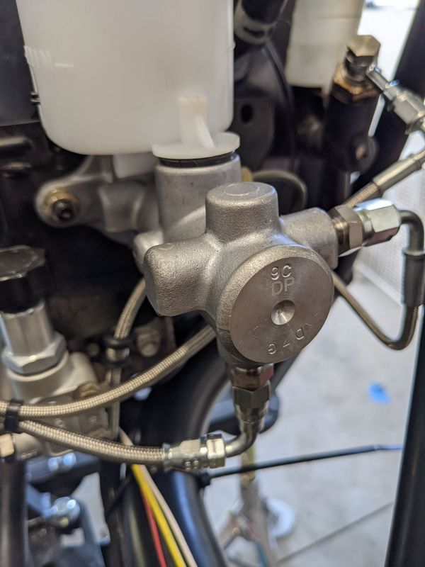 Brake master cylinder and rear proportioning valve